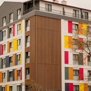 A building with multicolored panels on the side